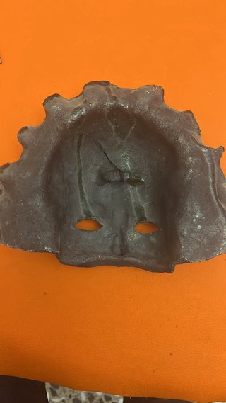 Máscara de bronce antigua