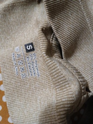 Top deportivo gym beige y gris