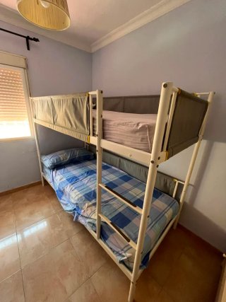 Cama litera metálica y de tela