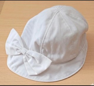Lote bebé niña: Vestido Kiabi y gorrito