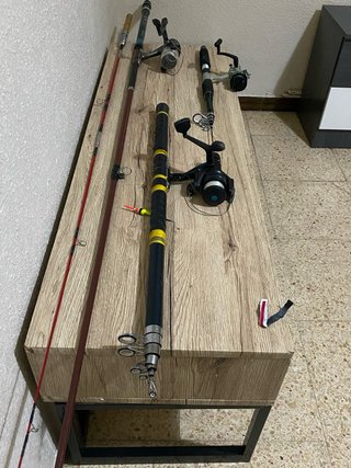 Caña de pescar con carrete y flotador