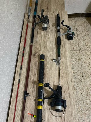 Caña de pescar con carrete y flotador