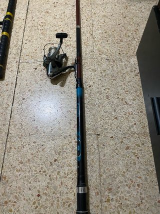 Caña de pescar con carrete y flotador