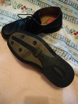 Sapatos masculinos pretos de couro