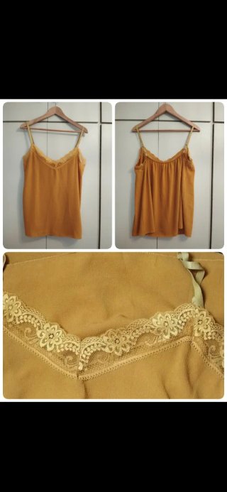 Camiseta mostaza con tirantes y encaje
