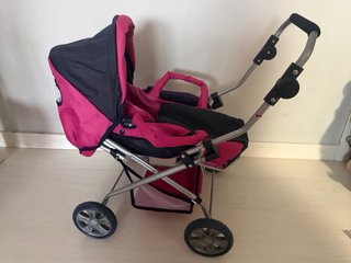 Carro de juguete para muñecas