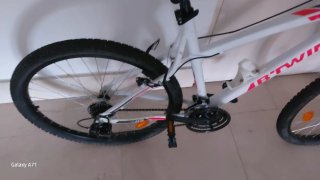 Bicicleta Btwin Blanca con Detalles Rosas