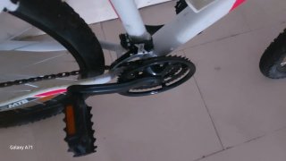 Bicicleta Btwin Blanca con Detalles Rosas