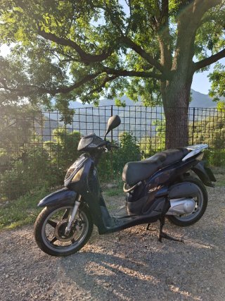 Honda SH 125 Scooter blava i plata