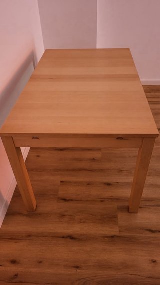 Mesa de comedor extensible de madera
