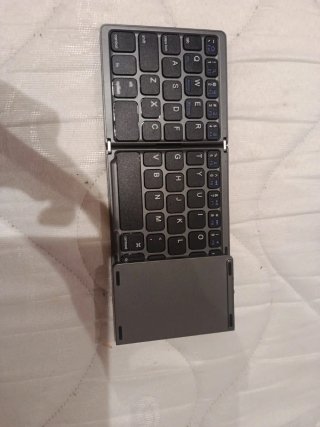 Teclado Bluetooth Plegable Para Móvil y Tablet