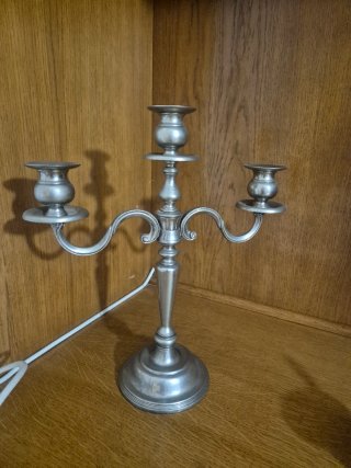 Pareja de candelabros de metal plateado