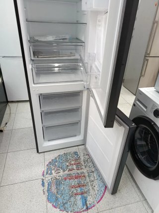 Nevera negra dispensador de agua Nueva Con Golpes