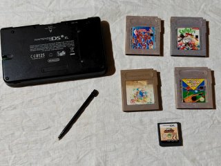 Nintendo DSi XL Verde + Caricatore + 5 Giochi