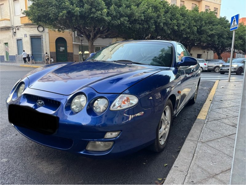 hyundai coupe 1,6 - foto 1