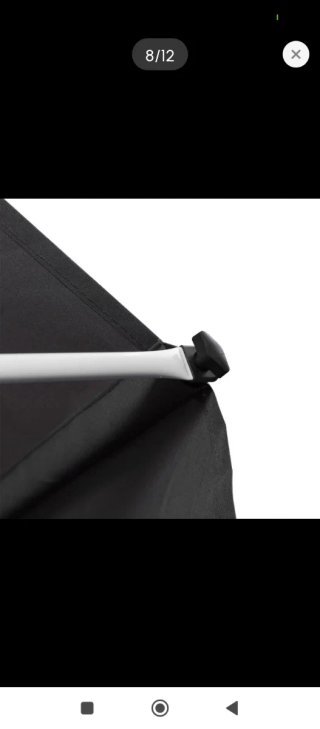 Toldo retráctil gris para jardín