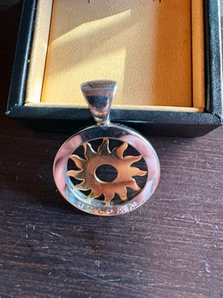 Colgante Bulgari Sol Oro y Plata