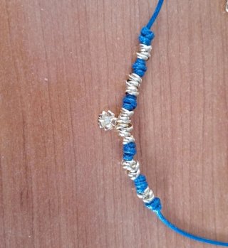 Collana Dodo con charm fiore e nodini