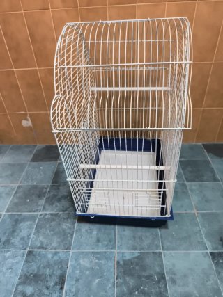 Jaula para pájaros blanca y azul