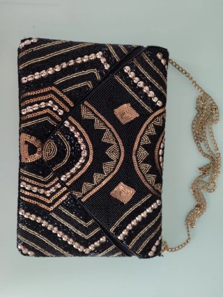 Bolso fiesta Bala Booste negro y dorado