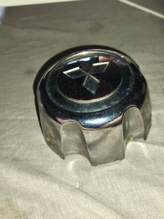 Tapa llanta Mitsubishi cromada