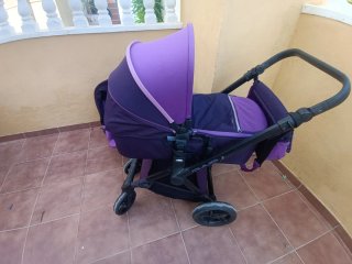 Carrito de bebé color púrpura. 3 piezas