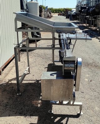 Llenadora lineal manual de botes y tarros