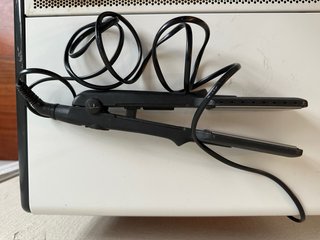 Plancha de pelo Jata negra