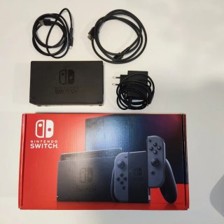 Nintendo Switch V2 + 4 Joy-Cons + 2 Juegos