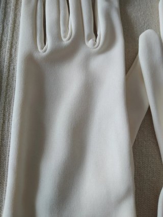 Guantes de niños blancos y beige y azul