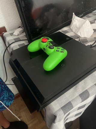 PS4 con mando verde