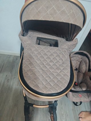 Cochecito de bebé +silla de coche +algún accesorio