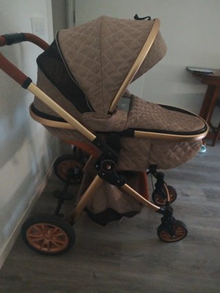 Cochecito de bebé +silla de coche +algún accesorio