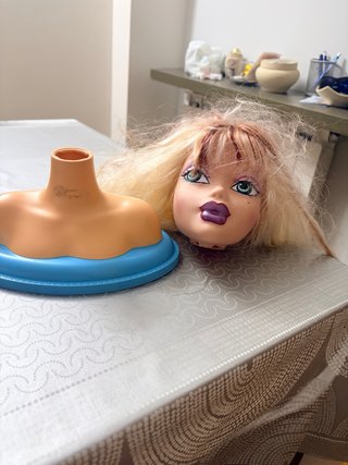 Cabeza de Barbie con torso
