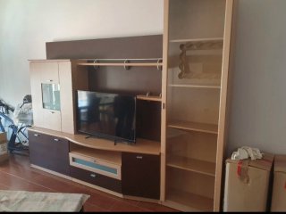 Mueble de salón modular beige y marrón