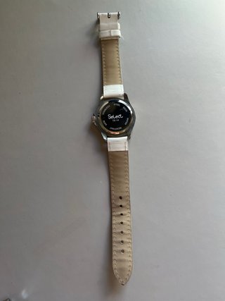 Reloj SELECT blanco y plateado