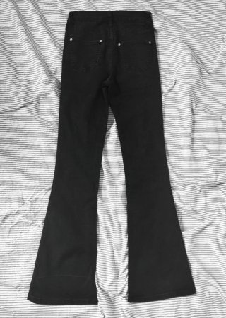 Jeans acampanados negros niña talla 16