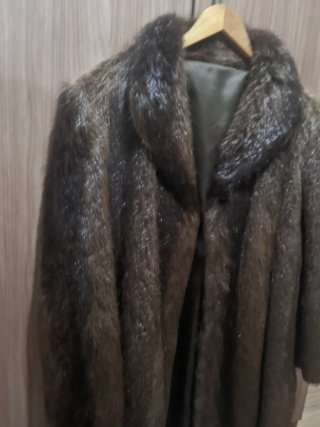 Elegante chaqueta de pelo real auténtico,