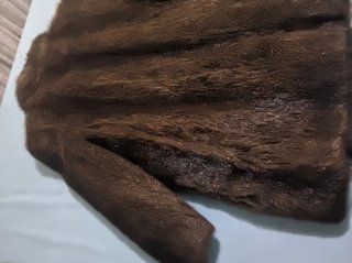 Elegante chaqueta de pelo real auténtico,