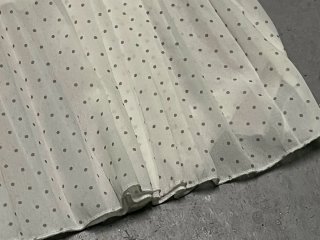Falda plisada lunares blanca
