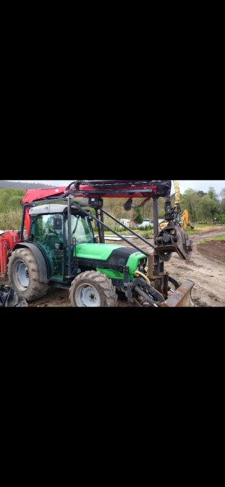 Tractor con grúa fassi