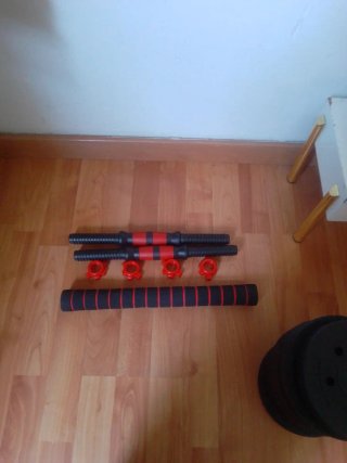 Pesi e manubri regolabili
