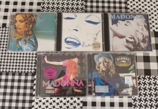 5 CDs de Madonna.