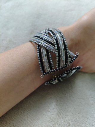 Pulsera trenzada plata y negro