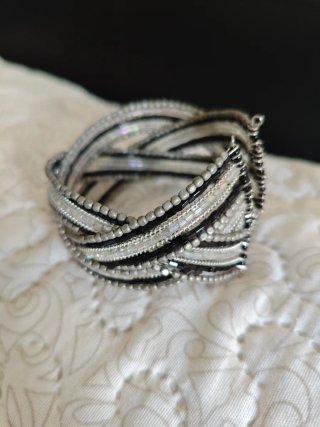 Pulsera trenzada plata y negro