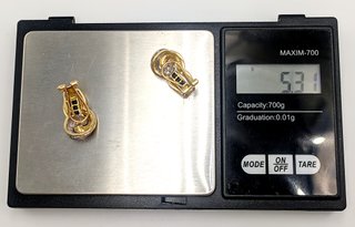 Pendiente de oro combinado 18k circonitas, 5.31 g.