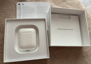 Airpods con estuche de carga