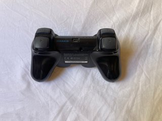 Playstation 3 Slim con 2 mandos