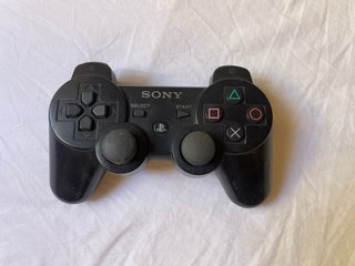 Playstation 3 Slim con 2 mandos