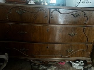 Conjunto de cama antiguo de madera tallada
